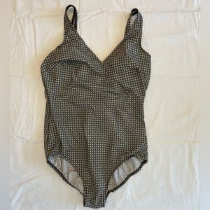 Miraclesuit one piece bathing suit.